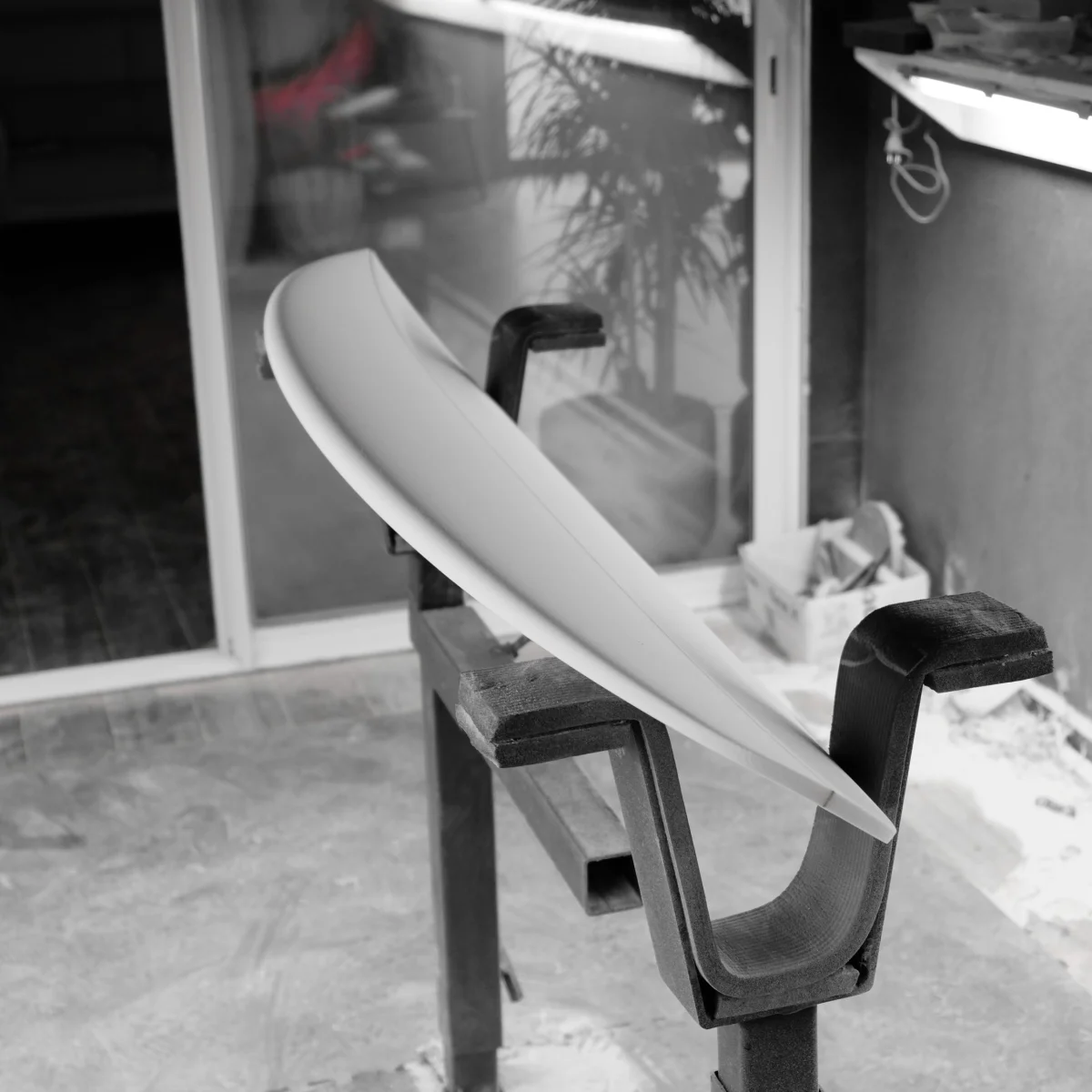 Alessandro Pierre – surfboard shaper in his workshop